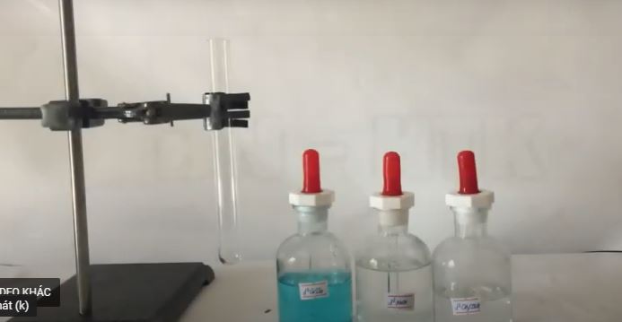 Thí nghiệm của acetic acid tác dụng với với copper(II) hydroxide