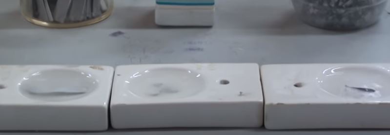 Thí nghiệm dung dịch hydrochloric acid  tác dụng với kim loại